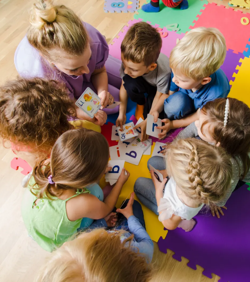 Kids playing in a circle at Day Care