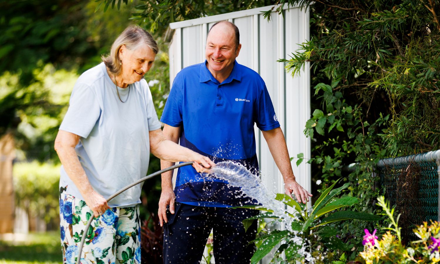 Man watering garden