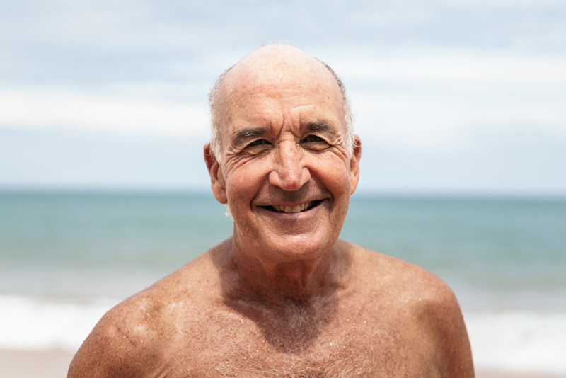 Bokarina Beach Village man at the beach