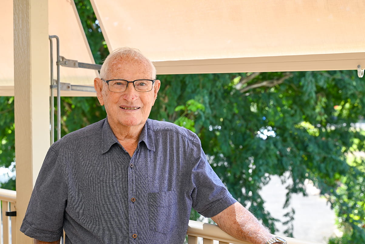 Eric standing on the veranda of his unit at Argyle Gardens Bundaberg