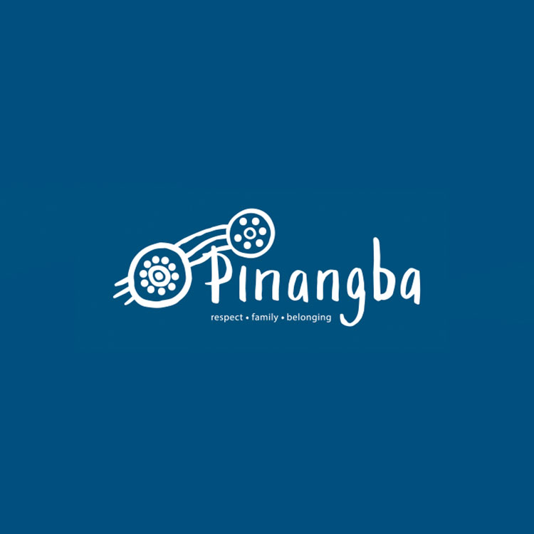 Our Pinangba artwork is inspired by the warmth and light of a campfire, which represents unconditional love burning at the heart of the family. The smaller fire symbol represents the family in their home community; the larger symbol represents the layers of support within the Elders Village. The three lines represent journeys and the building of new relationships.