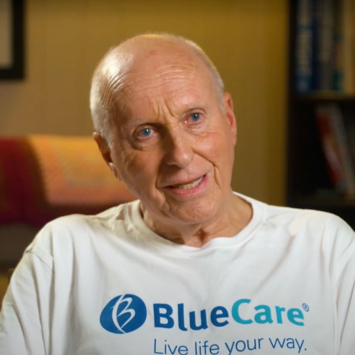 BlueCare volunteer David smiling at camera