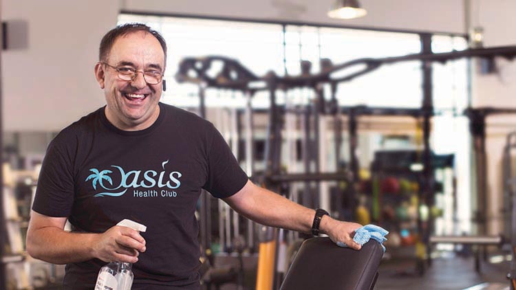 man working inside a gymnasium