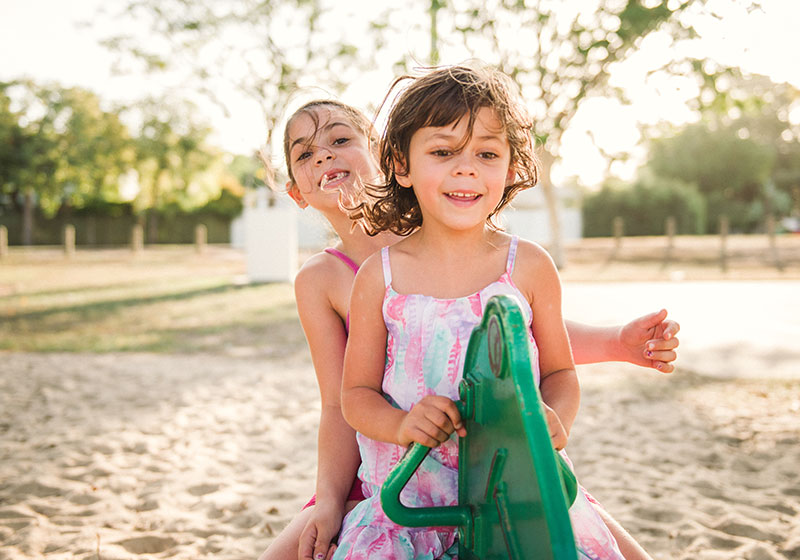 two children having fun in playground