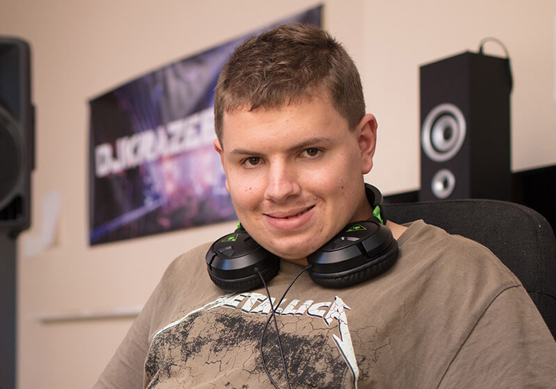 Young disabled man smiling at camera