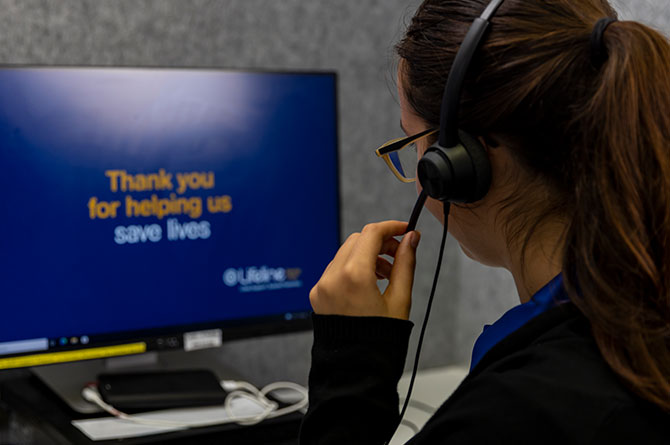 Lifeline worker on a call