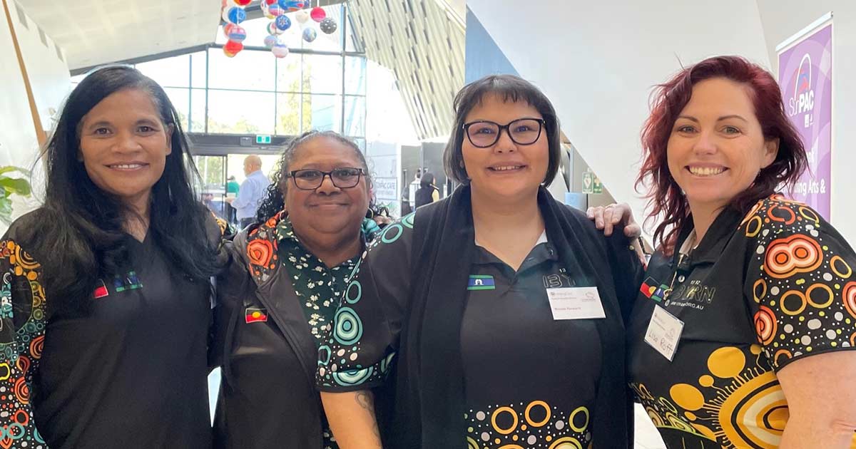 Lisa Roff (far right) stands with other members of the 13YARN team.