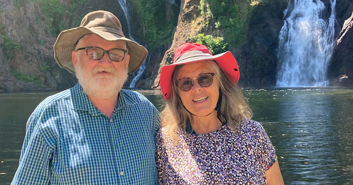 Maree Sarcoma patient standing in front of waterfall with her husband