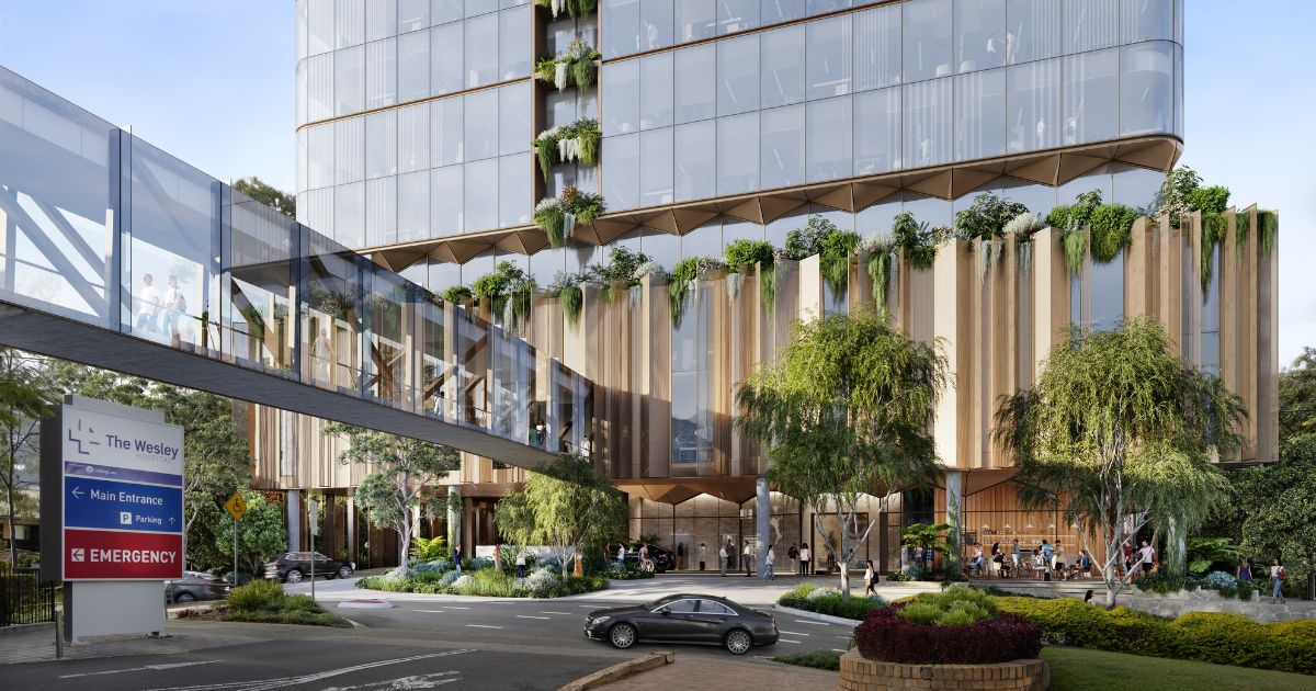 An artist's rendering of The Wesley Hospital expansion, showing a multi-story building linked to the hospital by a footbridge.